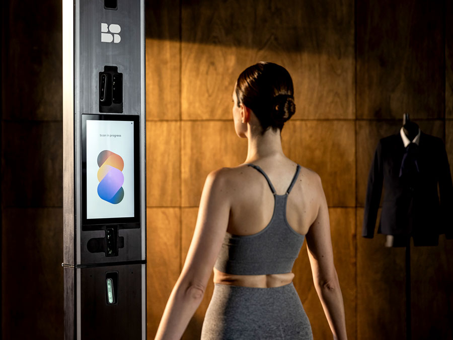 Woman on scanner facing screen