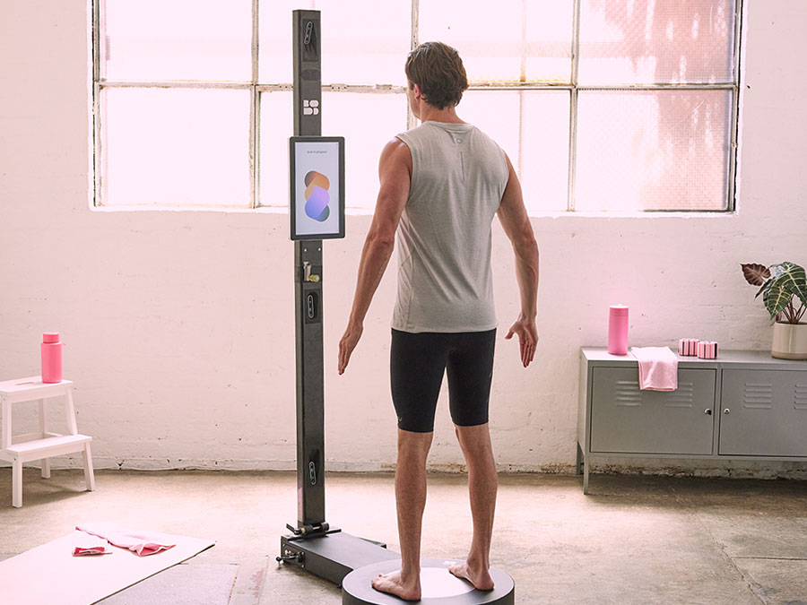 man standing on scanner wellness setting
